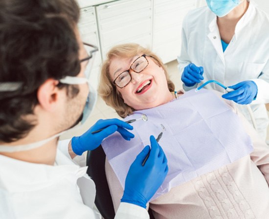 Woman smiling in the dental chair