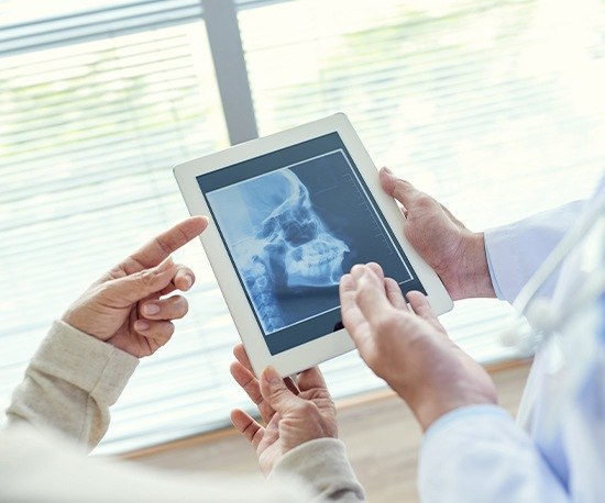 X-Ray of jaw and skull bone on tablet computer